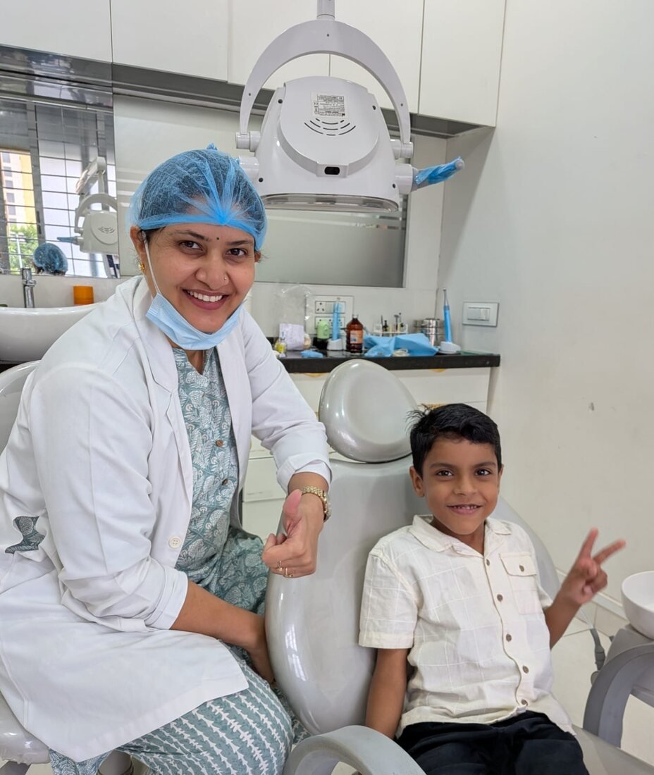 Young boy smiling with the dentist